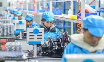 Workers are busy on the lithium battery production line at a new-energy company in Yongzhou, Central China's Hunan Province on December 30, 2024, as they strive to boost production at the end of the year. In the first ten months of 2024, China's total lithium battery production reached 890 GWh, marking a 16 percent year-on-year increase, according to official data. Photo: VCG